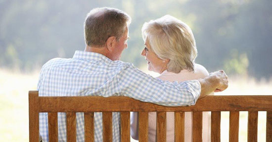 Senior Couple Talking on a bench